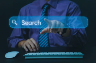 Business professional typing on keyboard with digital search bar overlay.
