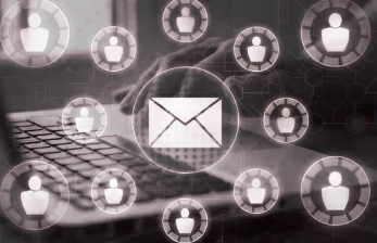 Digital graphic showing email icon surrounded by multiple people icons connected in a network.